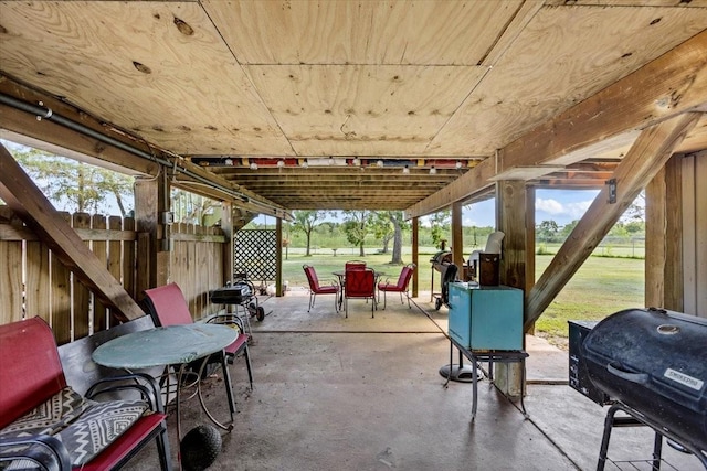 view of patio / terrace featuring area for grilling and fence