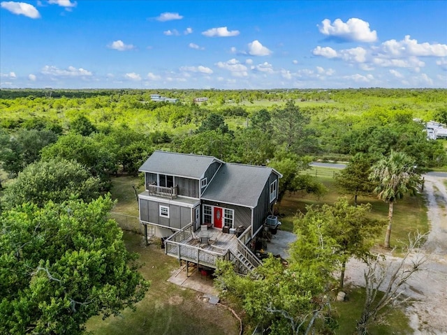 view from above of property featuring a forest