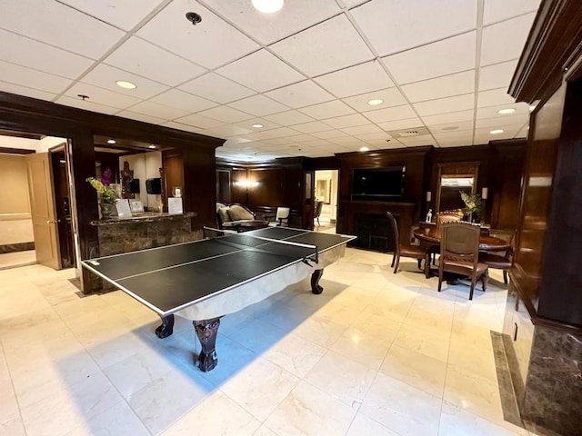 3525 Sage Rd Unit 704, Houston, TX 77056 - recreation room with a paneled ceiling, a fireplace, and recessed lighting