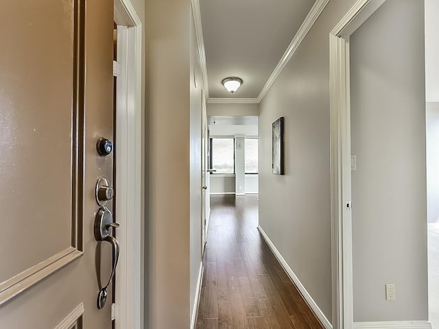 3525 Sage Rd Unit 704, Houston, TX 77056 - hallway featuring ornamental molding, dark wood-type flooring, and baseboards
