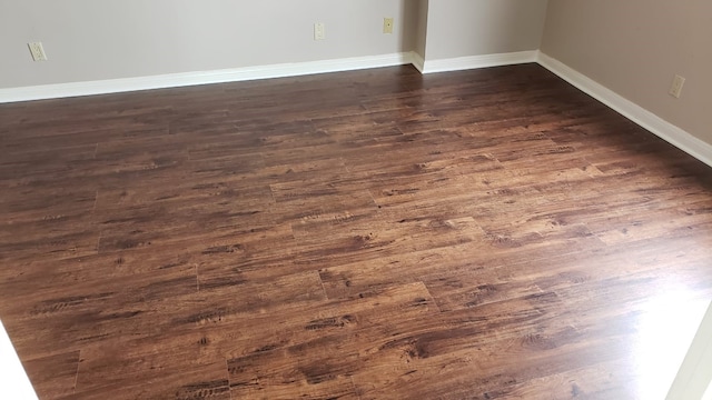 3525 Sage Rd Unit 704, Houston, TX 77056 - empty room with dark wood finished floors and baseboards