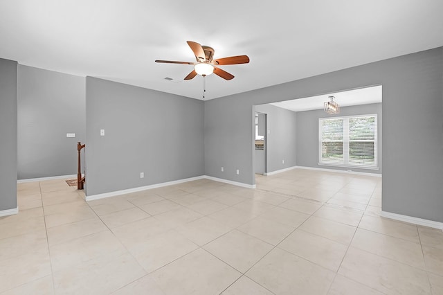 1809 Palo Duro St, Friendswood, TX 77546 - unfurnished room with ceiling fan, light tile patterned flooring, baseboards, and a chandelier