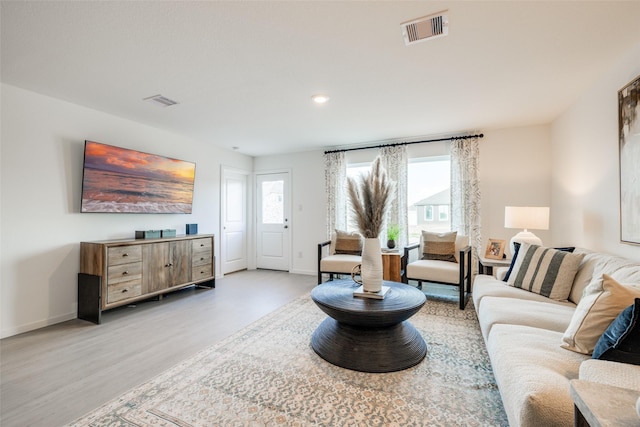 3012 Wild Dunes Dr, Katy, TX 77493 - living area with light wood-type flooring, baseboards, and recessed lighting