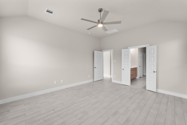 18423 Windy Knoll Way, Houston, TX 77084 - unfurnished bedroom with lofted ceiling, baseboards, light wood-type flooring, and a ceiling fan