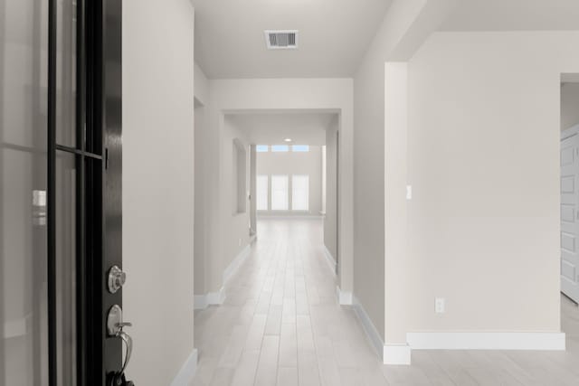 18423 Windy Knoll Way, Houston, TX 77084 - hallway featuring baseboards and light wood finished floors