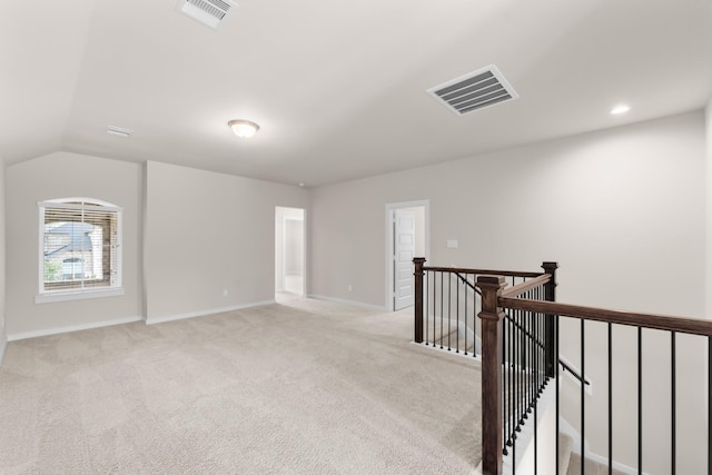 18423 Windy Knoll Way, Houston, TX 77084 - additional living space with light colored carpet, baseboards, and lofted ceiling