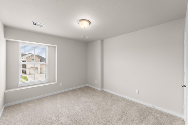 18423 Windy Knoll Way, Houston, TX 77084 - carpeted spare room with baseboards
