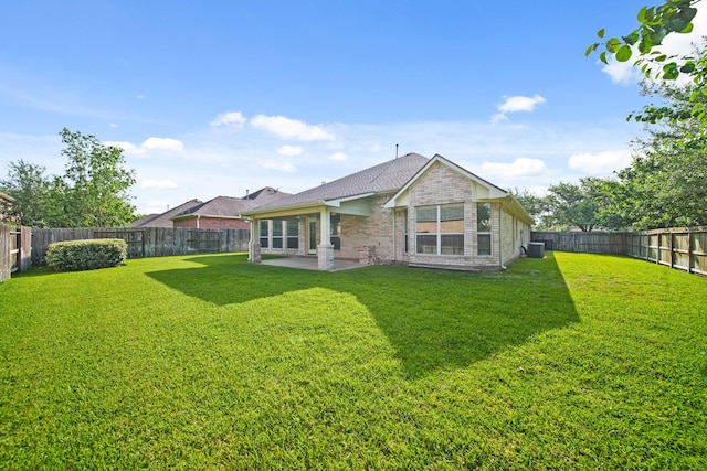 1910 Edenfield Ln, Sugar Land, TX 77479 - rear view of property featuring brick siding and a patio area