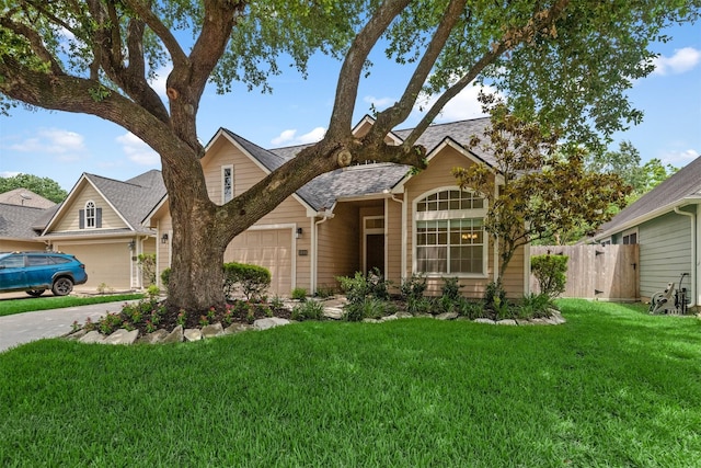 13014 Vivienne Westmoreland Dr, Cypress, TX 77429 - view of front facade with an attached garage and driveway