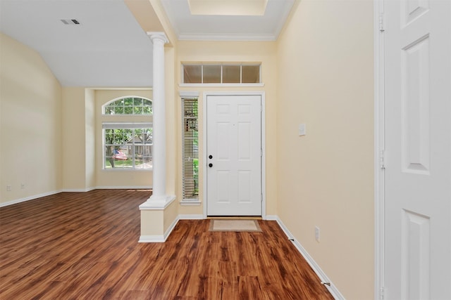 13014 Vivienne Westmoreland Dr, Cypress, TX 77429 - entryway with ornate columns, dark wood finished floors, baseboards, and ornamental molding