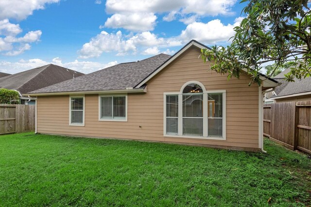 13014 Vivienne Westmoreland Dr, Cypress, TX 77429 - back of property featuring a shingled roof