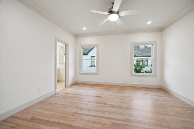 3707 Jardin St, Houston, TX 77005 - spare room featuring ornamental molding, plenty of natural light, light wood-style floors, a ceiling fan, and baseboards