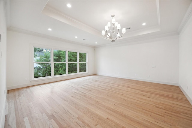 3707 Jardin St, Houston, TX 77005 - spare room with a raised ceiling, a chandelier, light wood-style floors, crown molding, and recessed lighting
