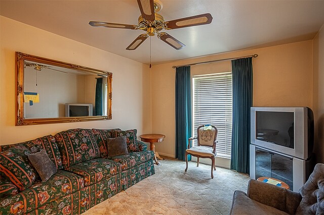 9385 Shepherd Dr, Beaumont, TX 77707 - carpeted living room with ceiling fan