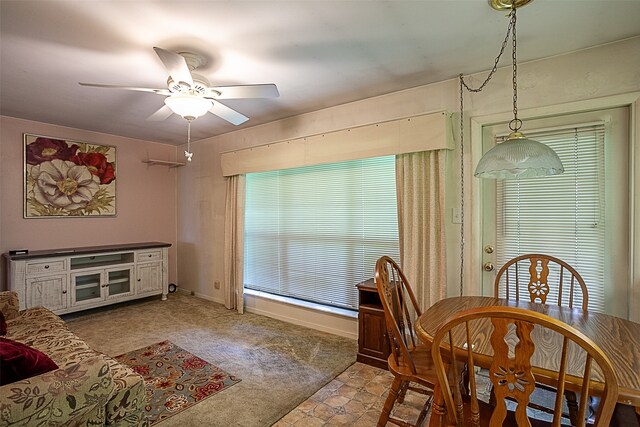 9385 Shepherd Dr, Beaumont, TX 77707 - carpeted dining area with ceiling fan