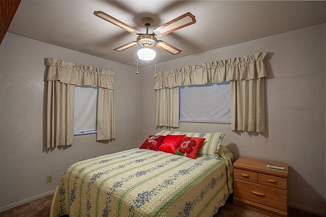 9385 Shepherd Dr, Beaumont, TX 77707 - carpeted bedroom featuring baseboards and ceiling fan