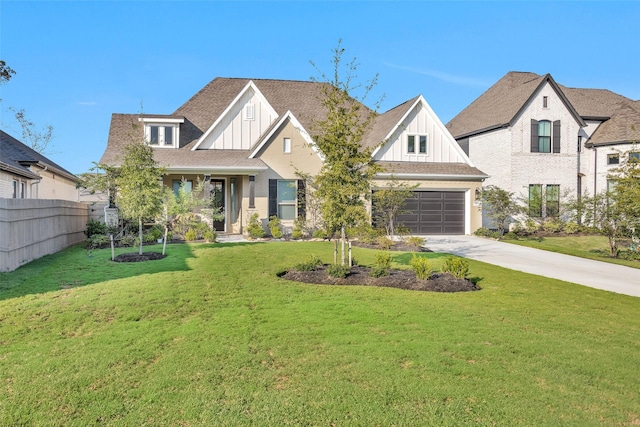 15527 Salmon Springs Dr, Conroe, TX 77302 - view of front facade featuring board and batten siding, concrete driveway, and a shingled roof