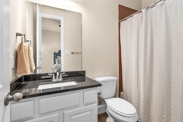 15527 Salmon Springs Dr, Conroe, TX 77302 - full bathroom featuring toilet, vanity, a shower with shower curtain, and connected bathroom