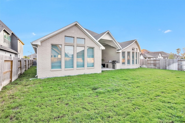15527 Salmon Springs Dr, Conroe, TX 77302 - rear view of house featuring brick siding