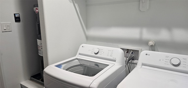 11378 Underwood St, Willis, TX 77318 - laundry area featuring washer and dryer
