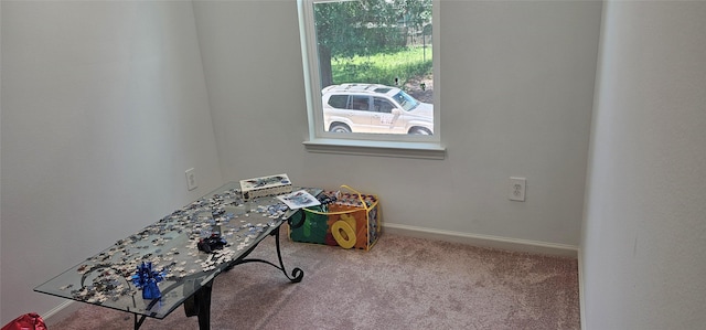 11378 Underwood St, Willis, TX 77318 - office area featuring carpet floors and baseboards
