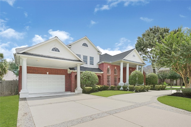 16506 Emilia Ct, Spring, TX 77379 - view of front of property with concrete driveway, brick siding, and stucco siding