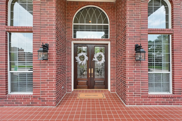 16506 Emilia Ct, Spring, TX 77379 - property entrance with french doors and brick siding