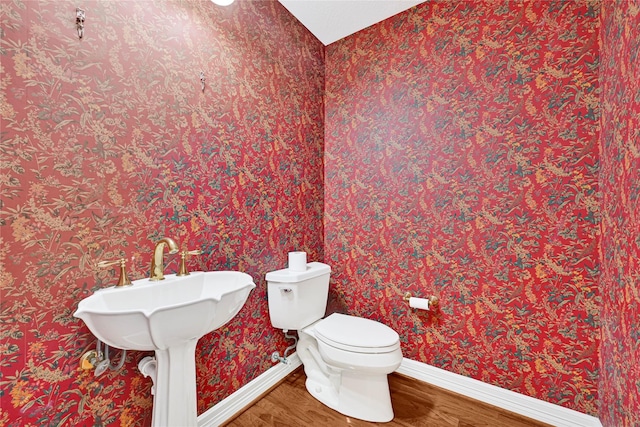 16506 Emilia Ct, Spring, TX 77379 - bathroom with baseboards and wood finished floors