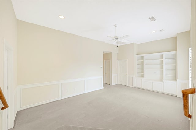 16506 Emilia Ct, Spring, TX 77379 - unfurnished room featuring ceiling fan, carpet flooring, a wainscoted wall, a decorative wall, and recessed lighting