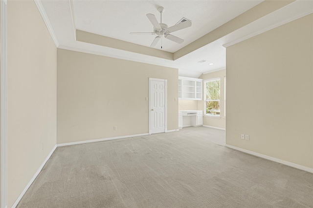 16506 Emilia Ct, Spring, TX 77379 - unfurnished room featuring a ceiling fan, light carpet, crown molding, and a raised ceiling