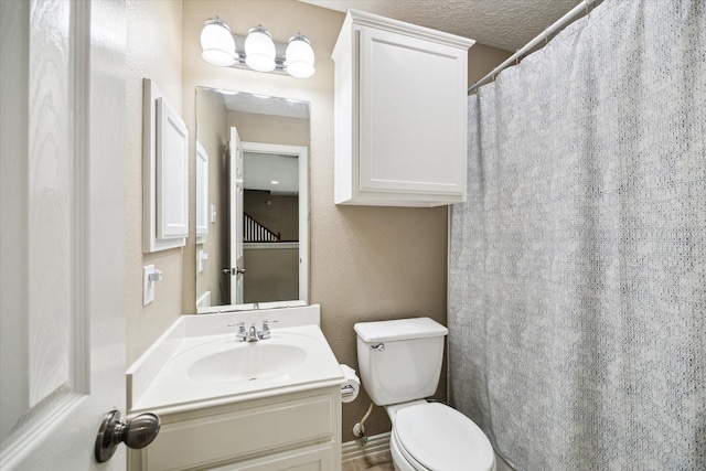 7327 Crescent Bridge Ct, Humble, TX 77396 - bathroom featuring toilet, vanity, and a shower with shower curtain