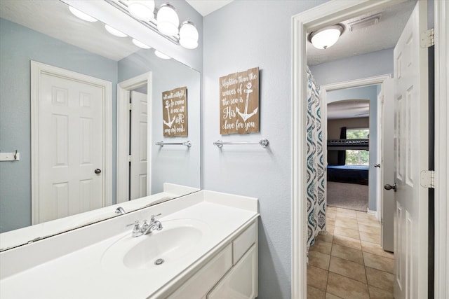 7327 Crescent Bridge Ct, Humble, TX 77396 - bathroom featuring vanity and tile patterned flooring