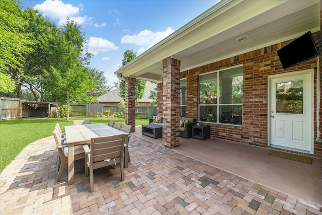 7327 Crescent Bridge Ct, Humble, TX 77396 - view of patio featuring outdoor dining area and an outdoor hangout area