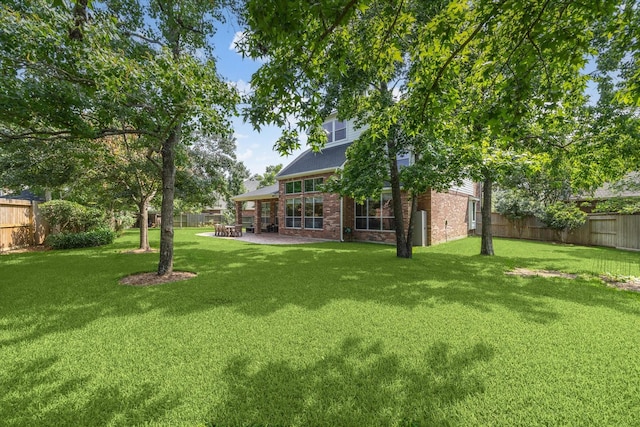 7327 Crescent Bridge Ct, Humble, TX 77396 - view of yard featuring a patio