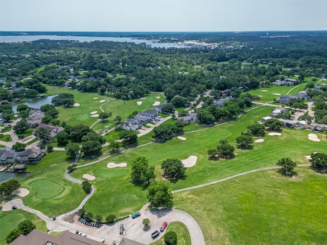 109 Moonspinner, Conroe, TX 77356 - aerial view of property's location with a large body of water, nearby suburban area, and a golf club