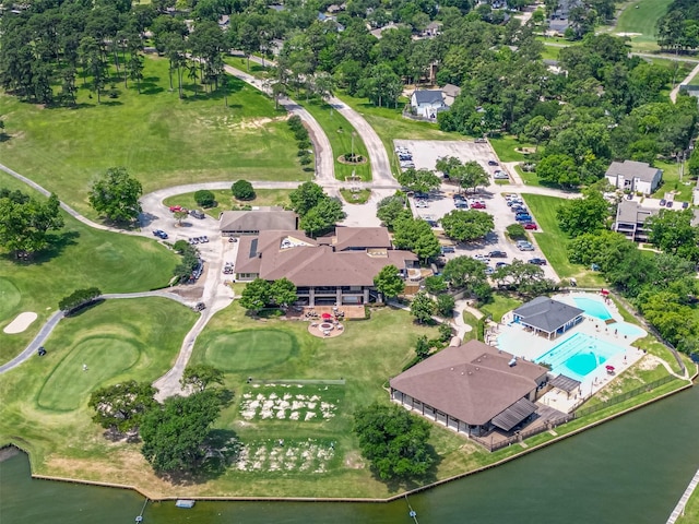 109 Moonspinner, Conroe, TX 77356 - bird's eye view of a nearby body of water and a pool area