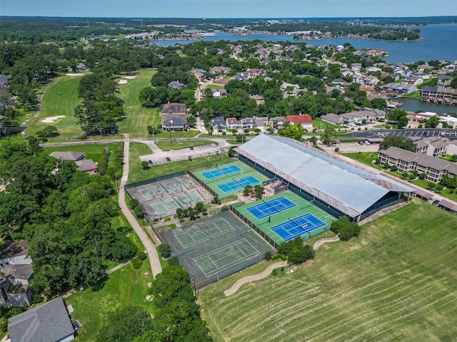 109 Moonspinner, Conroe, TX 77356 - aerial perspective of suburban area featuring a nearby body of water