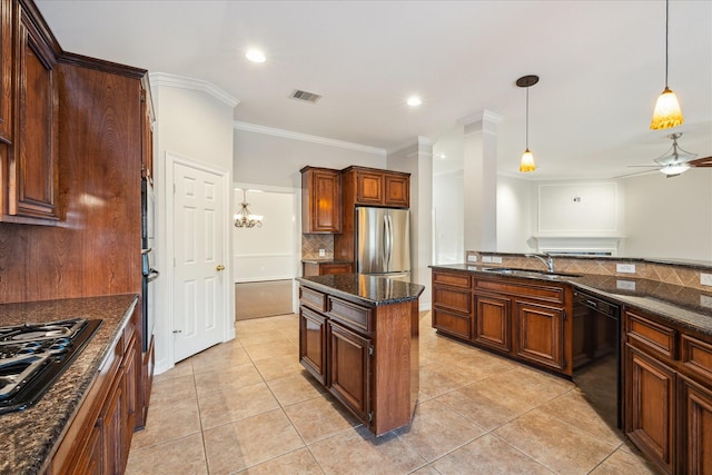 1044 Cayman Bend Ln, League City, TX 77573 - kitchen featuring black appliances, a sink, decorative backsplash, crown molding, and pendant lighting