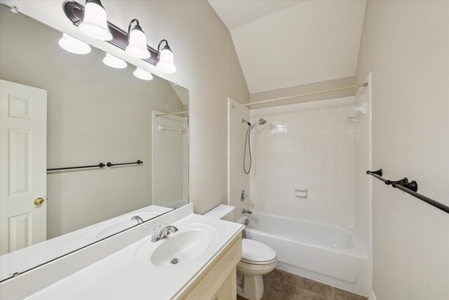 1044 Cayman Bend Ln, League City, TX 77573 - bathroom with toilet, vanity, tub / shower combination, tile patterned flooring, and vaulted ceiling