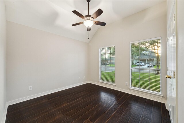 1044 Cayman Bend Ln, League City, TX 77573 - unfurnished room with dark wood-style flooring, baseboards, lofted ceiling, and a ceiling fan