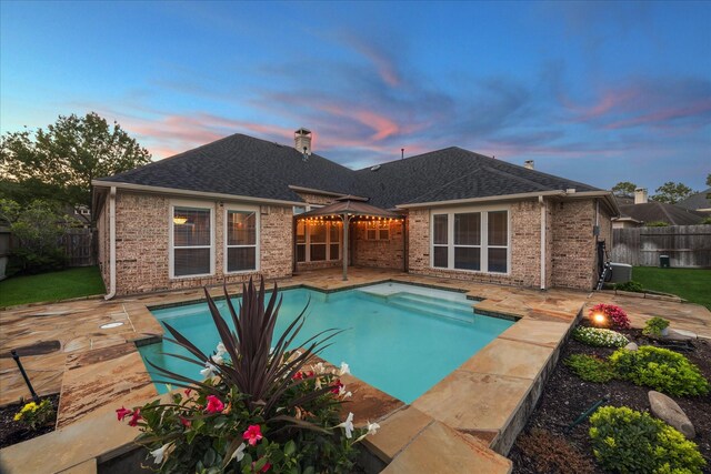 1044 Cayman Bend Ln, League City, TX 77573 - view of swimming pool with a patio area, a fenced backyard, central air condition unit, and a gazebo