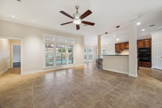 1044 Cayman Bend Ln, League City, TX 77573 - unfurnished living room featuring ornamental molding, ceiling fan, recessed lighting, baseboards, and light tile patterned floors