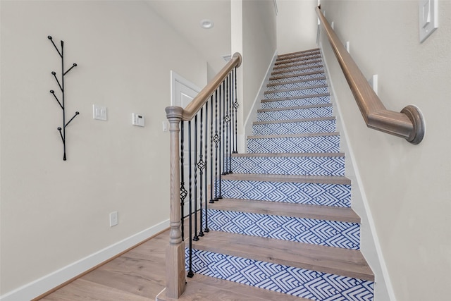 144 Knightsbridge Park Ln, Houston, TX 77018 - stairs with baseboards and parquet flooring