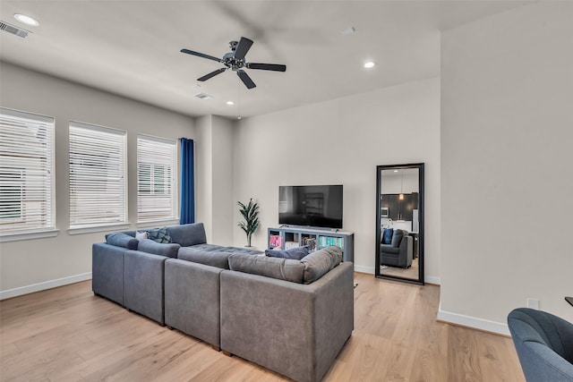144 Knightsbridge Park Ln, Houston, TX 77018 - living room featuring a ceiling fan, light wood finished floors, baseboards, and recessed lighting