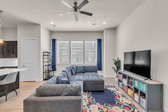 144 Knightsbridge Park Ln, Houston, TX 77018 - living area featuring light wood-style flooring, a ceiling fan, recessed lighting, and baseboards
