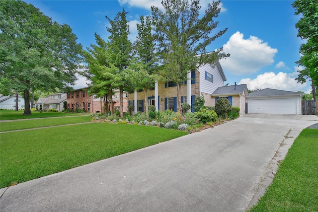 4822 Droddy St, Houston, TX 77091 - view of front facade with a front lawn, brick siding, and concrete driveway