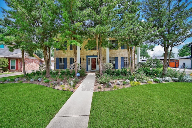 4822 Droddy St, Houston, TX 77091 - view of front of house with brick siding and a front lawn