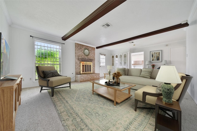 4822 Droddy St, Houston, TX 77091 - living area featuring beamed ceiling, plenty of natural light, ornamental molding, light carpet, and a fireplace