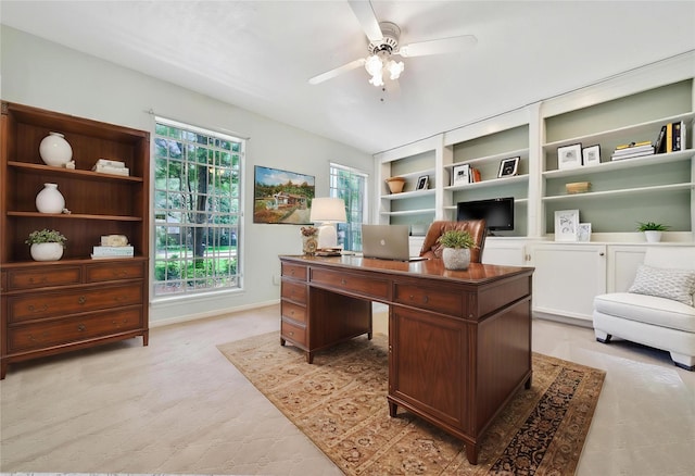 4822 Droddy St, Houston, TX 77091 - home office featuring a ceiling fan and baseboards