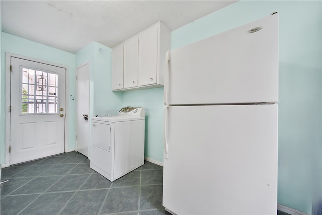 4822 Droddy St, Houston, TX 77091 - laundry room with washer / dryer, cabinet space, and dark tile patterned floors